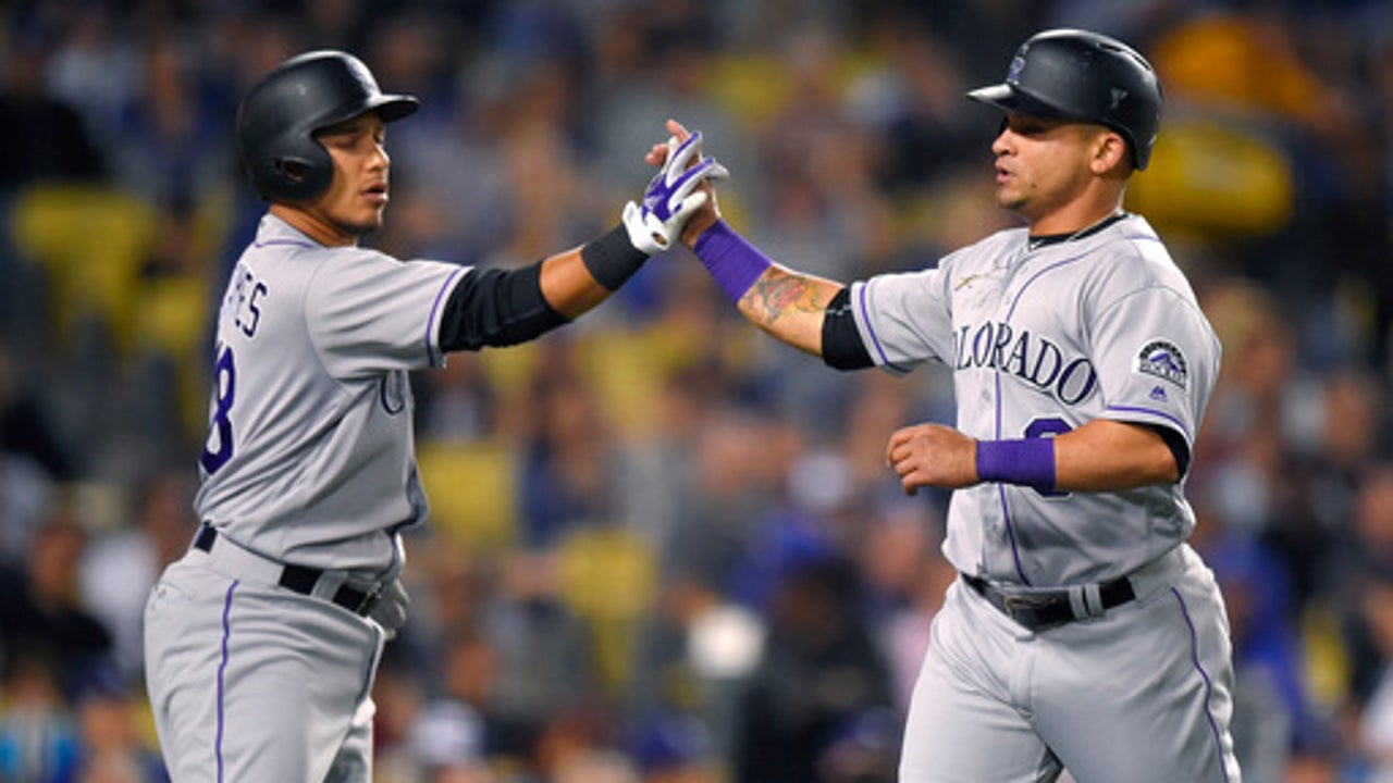 Rusin, Rockies throw 4-hitter in 1-0 win over Dodgers